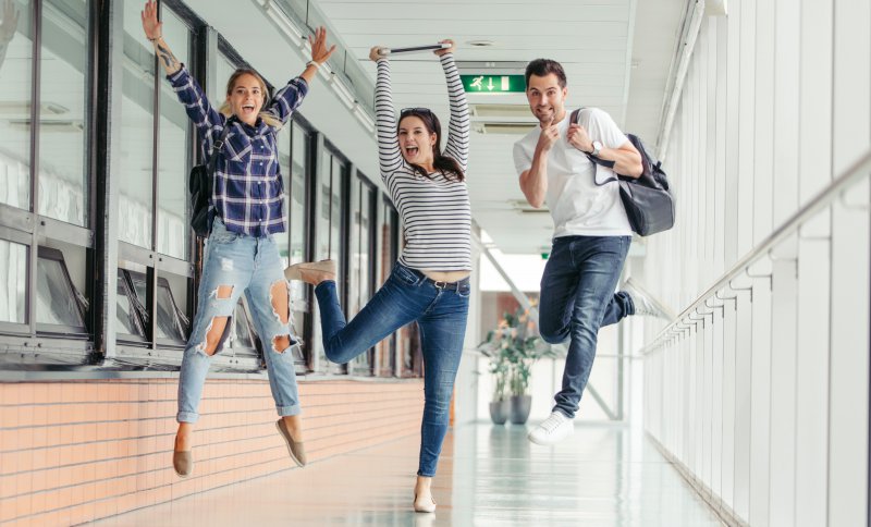 cheerful_students_jumping.jpg